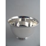 AN EDWARD VI SILVER SLOP BOWL, London 1908 C & S Co Ltd. Slightly flared circular rim on a