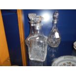 Three cut glass decanters