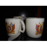 Five assorted commemorative mugs