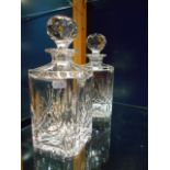 A pair of crystal decanters