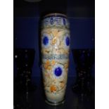 A Royal Doulton tubular vase with floral