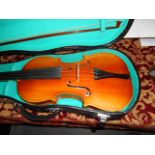 A Lark violin and bow in a fitted case