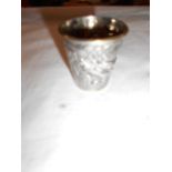 A small Chinese silver cup marked WH Wan