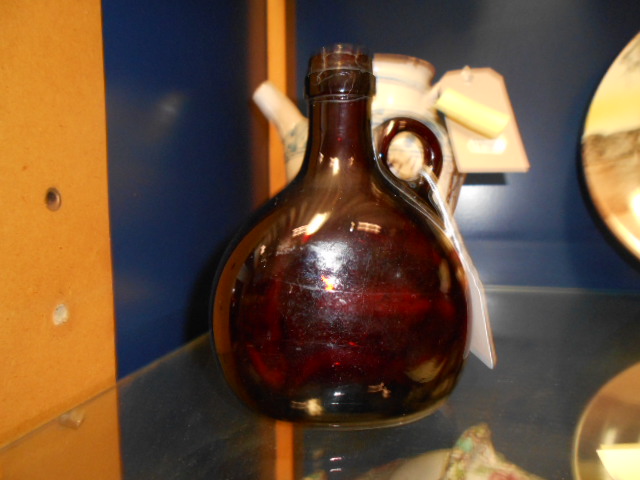 A 19th C brown glass wine bottle