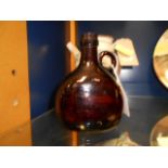 A 19th C brown glass wine bottle