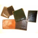 A mixed selection of leather wallet and