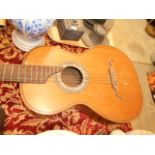 A vintage guitar having birds eye maple