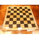 A modern Italian marble chessboard