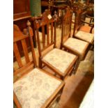 A set of oak dining chairs