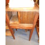 An 18th C oak bedside cupboard with 3/4