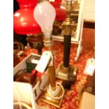 Two brass Corinthian column lamps and sh