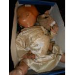 A box of antique doll parts, mainly comp