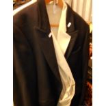 A black Sartoriani suit jacket and a bei