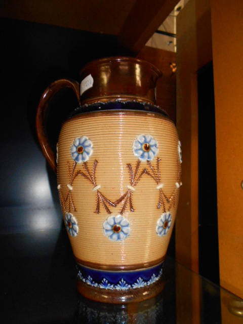 A Doulton Lambeth stoneware jug with rib