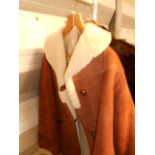 A vintage ladies tan sheepskin jacket