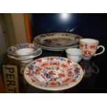 A selection of Oriental plates, cups and bowls