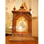 A German oak cased bracket clock of arch