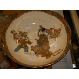 A Japanese bowl with figural and floral