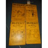 Four Daily Express 'Rupert' volumes to include 'Enchanted Princess', 'Black Dwarf',