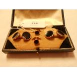 A pair of 9ct gold and onyx cufflink's and a pair of studs,