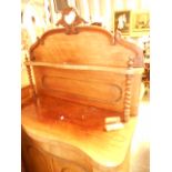 A Victorian mahogany chiffonier having scrolled and galleried top above a frieze drawer with