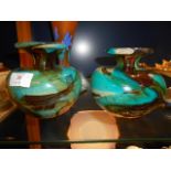 A pair of Mdina glass squat vases with stylised inclusions,