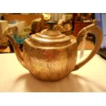 A London 1802 silver fluted teapot marks to base,