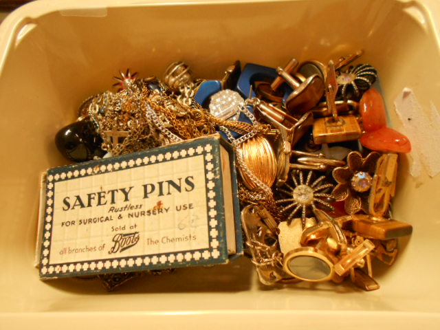 A quantity of vintage costume jewellery to include necklaces,