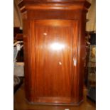 A 19th C mahogany wall mounted corner cabinet,