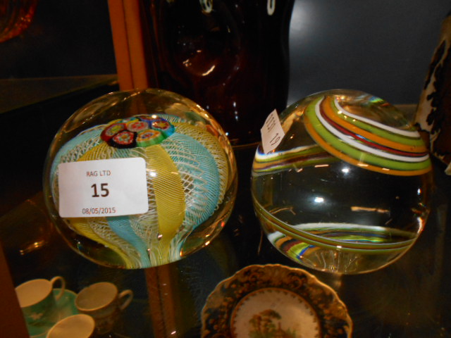 Two glass paperweights having millefiori and swirl decoration