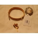 A small lot of costume jewellery; rolled gold bangle,