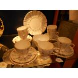 A Royal Grafton part tea set in 'Chantilly' pattern comprising cake plate, cups, saucers,