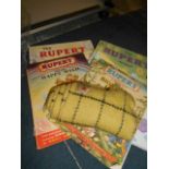 A small quantity of Rupert ephemera, two softback books,