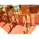 A set of twelve mahogany rail back dining chairs,