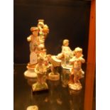 A selection of continental porcelain figures (A/F)