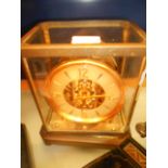 A Swiss Jaeger Le Coultre Atmo clock in lacquered brass case,