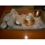 A set of six Egyptian silver demi-tasse cups and saucers