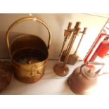 A brass coal scuttle, brass companion set,