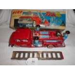 A Chinese tin plate Fire truck friction driven and siren boxed A/F
