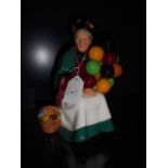 A Royal Doulton figurine 'The Old Balloon Seller',