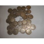 A selection of one shilling coins