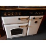 A Rangmaster electric cooker having five top hot-plates,