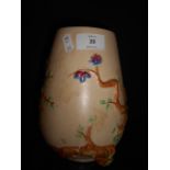 A Clarice Cliff vase having relief tree and floral decoration 8" high