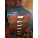 A metal five drawer cabinet