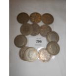 A selection of two shilling coins