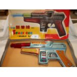 A 1960's Chinese tin-plate double barrel friction space gun boxed,