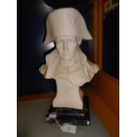 A Parian bust of Napolean resting on a marble base,