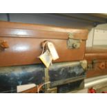 Two vintage tan leather suitcases together with a vintage blue suitcase