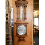 A 19th C oak cased barometer and thermometer each with silvered dials and Arabic numerals and