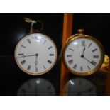 Two early 20th C circular brass timepieces both with white enamel dials and Roman numerals